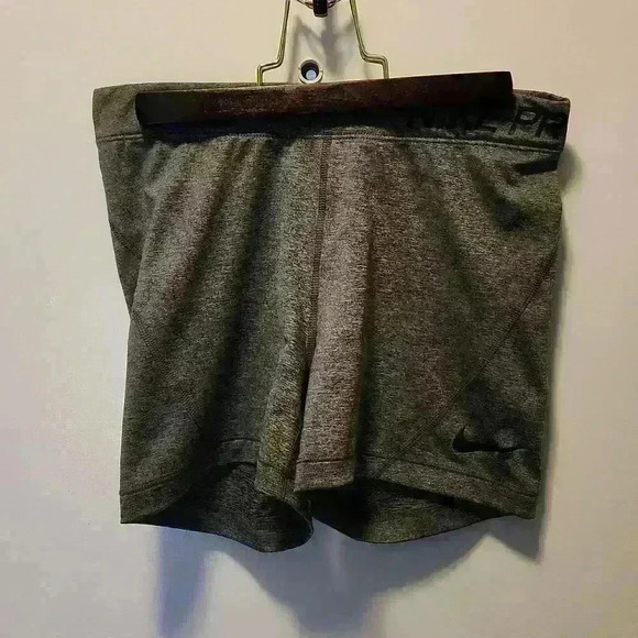 2 pair Nike pro shorts, dri-fit, womans medium, 1 pair gray the other black - Picture 1 of 4